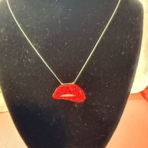 Red Lip Pendant Necklace on silver chain. Red pave’ crystals.